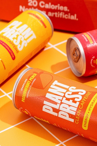 energy drink, sports drink, caffeinated beverage, performance drink, functional beverage, product launch, minimalist, energetic, bold, orange, yellow, red